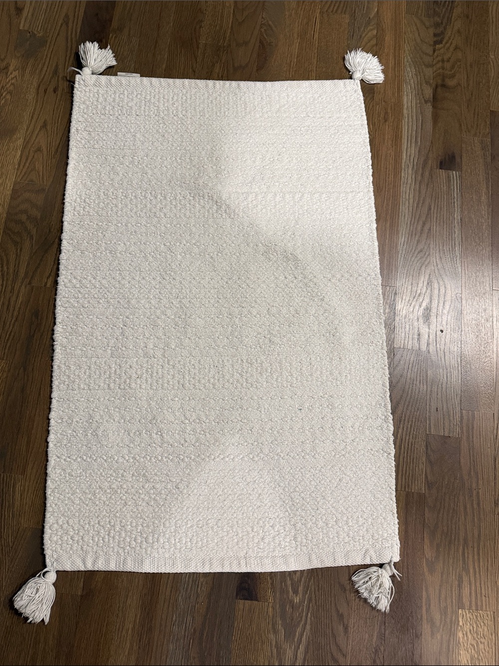 Magnolia Cream Textured Bath Mat with Tassels